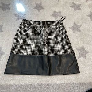 Houndstooth and faux leather skirt